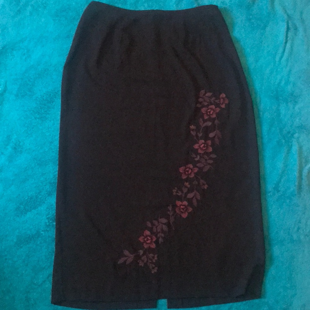 Long black skirt with intricate design